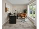 Bright home office with a large window, modern desk, and comfortable seating, ideal for productivity at 118 Brandi Dr, Rolesville, NC 27571