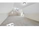 Spacious bonus room with neutral carpeting, a ceiling fan, and natural light streaming in from the window at 1211 New Grissom Way, Wake Forest, NC 27587