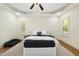 Comfortable bedroom featuring a neutral palette, ceiling fan, and natural light at 1211 New Grissom Way, Wake Forest, NC 27587