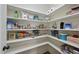 Well-stocked pantry with ample shelving and organized storage solutions at 1211 New Grissom Way, Wake Forest, NC 27587