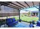 Inviting backyard patio area features a pergola, outdoor furniture, and view of the fenced yard and deck at 1254 Salters St, Burlington, NC 27215