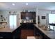View of modern eat-in kitchen with granite countertops and stainless steel sink at 1254 Salters St, Burlington, NC 27215