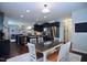 Open concept kitchen and eat-in dining area with stainless steel appliances at 1254 Salters St, Burlington, NC 27215