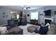 Spacious living room with dark wood floors and a view into the kitchen at 1254 Salters St, Burlington, NC 27215