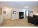Upstairs living room area with large screen television, and neutral paint at 1254 Salters St, Burlington, NC 27215