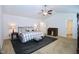 Bright and airy main bedroom with a ceiling fan and neutral paint at 1254 Salters St, Burlington, NC 27215