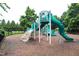 Community playground with slides, climbing structures, and safety surfacing for enjoyment at 1254 Salters St, Burlington, NC 27215