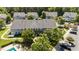 Beautiful townhome community featuring lush landscaping, a pool, and convenient parking at 1313 Legacy Greene Ave, Wake Forest, NC 27587