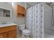 Bathroom featuring a light-colored vanity and a shower with a curtain at 1313 Legacy Greene Ave, Wake Forest, NC 27587
