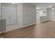Spacious living room with laminate floors and an open layout at 1313 Legacy Greene Ave, Wake Forest, NC 27587
