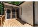 A shot of the porch with a screened in wall at 136 Hatchet Cv, Louisburg, NC 27549