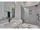 Modern bathroom with walk-in shower, stylish vanity, and black hardware at 14 Duck Bill Trl, Pittsboro, NC 27312