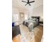 Inviting bedroom with a comfortable bed, dresser and lots of natural light at 14 Duck Bill Trl, Pittsboro, NC 27312