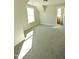 Bright bedroom features neutral paint, plush carpeting, and a sunny window at 14 Duck Bill Trl, Pittsboro, NC 27312