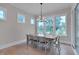 Dining room showcasing a modern chandelier and ample natural light at 14 Duck Bill Trl, Pittsboro, NC 27312