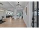 Open-concept foyer leading to the living room and kitchen with a hardwood floor at 14 Duck Bill Trl, Pittsboro, NC 27312