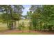 Scenic view of the lush golf course and well-manicured landscape from the property at 14 Duck Bill Trl, Pittsboro, NC 27312
