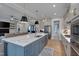 Elegant kitchen with a large island, modern appliances, and an open layout at 14 Duck Bill Trl, Pittsboro, NC 27312