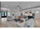 Open floor plan showcasing a living room, kitchen, and dining area at 14 Duck Bill Trl, Pittsboro, NC 27312