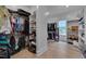 Spacious walk-in closet with custom shelving, ample hanging space, and hardwood floors at 14 Duck Bill Trl, Pittsboro, NC 27312