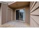 Patio with sliding glass door and door to exterior featuring siding of the townhome at 145 Coleridge Ct, Carrboro, NC 27510