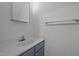 Bright bathroom featuring a gray vanity, white countertop and a mirror with chrome faucet at 145 Coleridge Ct, Carrboro, NC 27510