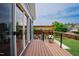 Exterior deck featuring outdoor seating and a relaxing backyard view at 2020 Cotton Barn Ct, Wendell, NC 27591