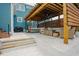 Charming back patio with hot tub, pergola, and stylish seating area, perfect for entertaining guests at 2020 Cotton Barn Ct, Wendell, NC 27591