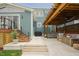 Lovely backyard with a pergola, a hot tub, comfortable seating, and stone pavers at 2020 Cotton Barn Ct, Wendell, NC 27591