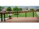 Decking area overlooking lush backyard with wood fencing and well-maintained landscaping at 2020 Cotton Barn Ct, Wendell, NC 27591