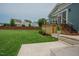 Backyard featuring a deck with stairs, a covered outdoor seating area, a green lawn, and a wood fence at 2020 Cotton Barn Ct, Wendell, NC 27591