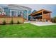 Beautiful backyard featuring a pergola, deck, and manicured lawn at 2020 Cotton Barn Ct, Wendell, NC 27591