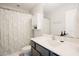 Bathroom featuring a single vanity, shower with tub, and neutral decor at 2020 Cotton Barn Ct, Wendell, NC 27591