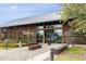 Modern community center featuring a metal roof, wood accents, and large windows at 2020 Cotton Barn Ct, Wendell, NC 27591