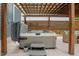 View of a hot tub with cover, with a covered outdoor seating area providing a perfect spot to relax and unwind at 2020 Cotton Barn Ct, Wendell, NC 27591