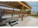 Outdoor hot tub area with a covered patio and lounge seating offer ample space for relaxation and entertainment at 2020 Cotton Barn Ct, Wendell, NC 27591