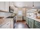Bright kitchen featuring stainless steel appliances and white subway tile backsplash at 2020 Cotton Barn Ct, Wendell, NC 27591