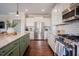 Well-equipped kitchen with stainless steel appliances and hardwood flooring at 2020 Cotton Barn Ct, Wendell, NC 27591