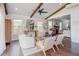 Bright sitting area with vaulted ceilings, wood beams, and lots of natural light at 2020 Cotton Barn Ct, Wendell, NC 27591