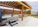 Outdoor patio with a hot tub, pergola, and comfortable seating area at 2020 Cotton Barn Ct, Wendell, NC 27591