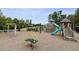 Community playground with swings, slides, and climbing structures, perfect for Gathering fun at 2020 Cotton Barn Ct, Wendell, NC 27591