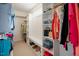 This walk-in closet features built-in shelving and hanging storage for optimal organization at 2020 Cotton Barn Ct, Wendell, NC 27591