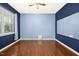 Cozy bedroom with wood floors and mirror wall at 213 Florence Dr, Clayton, NC 27527