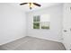 Neutral bedroom with plush gray carpet and natural light at 213 Florence Dr, Clayton, NC 27527