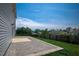 Backyard features a concrete patio and lush lawn, perfect for outdoor entertaining at 221 Hallow Oak St, Spring Lake, NC 28390