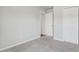 Bedroom featuring plush neutral carpet, grey walls and a white door at 221 Hallow Oak St, Spring Lake, NC 28390