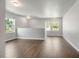 Spacious bonus room with luxury vinyl plank flooring, recessed lighting and plenty of natural light at 221 Hallow Oak St, Spring Lake, NC 28390