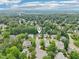 Drone shot of the community, surrounded by lush trees at 2317 Colony Woods Dr, Apex, NC 27523
