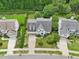 Aerial view of a home showcasing its landscaped yard and neighborhood at 2317 Colony Woods Dr, Apex, NC 27523