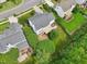 Aerial view of backyard with deck and surrounding landscape at 2317 Colony Woods Dr, Apex, NC 27523